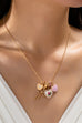 Multi Charm Porcelain Bow Ball Chain Necklace | 80N92892