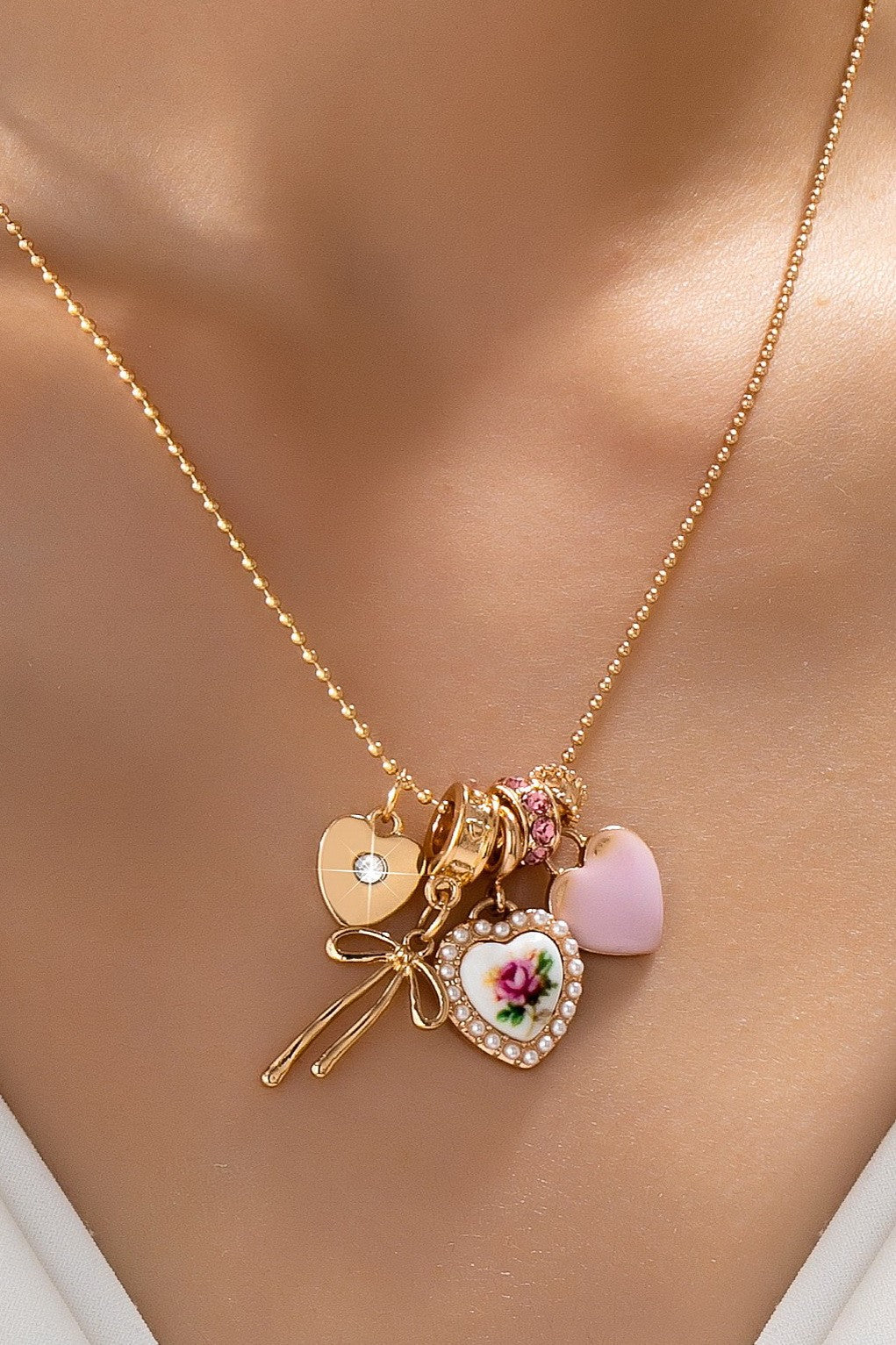 Multi Charm Porcelain Bow Ball Chain Necklace | 80N92892
