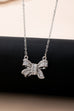 Sparkling Crystal Bow Pendant Necklace | 80N92845