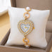 HEART RHINESTONE DIAL PEARL BRACELET WATCH | 80W008