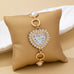 HEART RHINESTONE DIAL PEARL BRACELET WATCH | 80W008