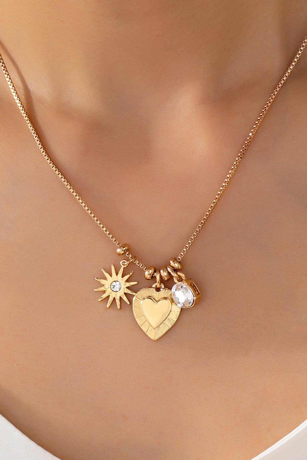 Celestial Heart and Starburst Charm Necklace | 80N93135 – JOSSLYN