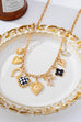 Checkered Heart Pearl Bow Multi-Charm Link Necklace | 80N93113