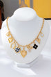 Checkered Heart Pearl Bow Multi-Charm Link Necklace | 80N93113