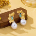 Textured Gold Floral & Pearl Dangle Earrings | 80E62427