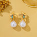 Textured Gold Floral & Pearl Dangle Earrings | 80E62427