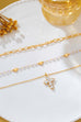 Multi-Strand Pearl & Crystal Cross Necklace | 80N93302