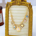 Vintage Heart Porcelain Multi Charm Necklace | 80N93300