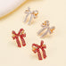 CHARMING RHINESTONE BOW EARRINGS | 40E524
