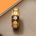 18K STAINLESS STEEL TARNISH FREE DAISY SPINNER RING | 40R155