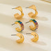 Multi Colored Baguette Twisted Hoop Trio Earring | 80E62566