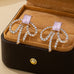Emerald-Cut Pink Crystal Rhinestone Bow Earrings | 80E62598