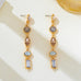 Multi Shape Gemstone Linear Drop Earrings | 80E62689