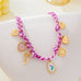 Corded Multi Charm Bow Heart Floral Necklace | 80N93440