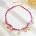 Corded Multi Charm Bow Heart Floral Necklace | 80N93440