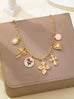 Vintage-Inspired Flower Pearl Cross Heart Charm Necklace | 80N93477