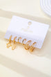 Gold-Tone Cross Baguette Huggie Hoop Earring Trio Set | 80E62865