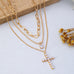 Multi-Layered Pearl Cross Rhinestone Necklace | 80N93577