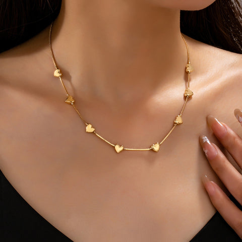 Dainty Gold Puffy Heart Station Necklace | 80N93588