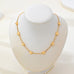 Dainty Gold Puffy Heart Station Necklace | 80N93588