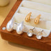 Teardrop Crystal Gold Pearl Trio Stud Earring Set | 80E63015
