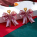 Pink Coquette Holiday Acrylic Bow Drop Earrings | 80E63507