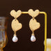 Textured Double Heart Pearl Drop Earrings | 80E63501